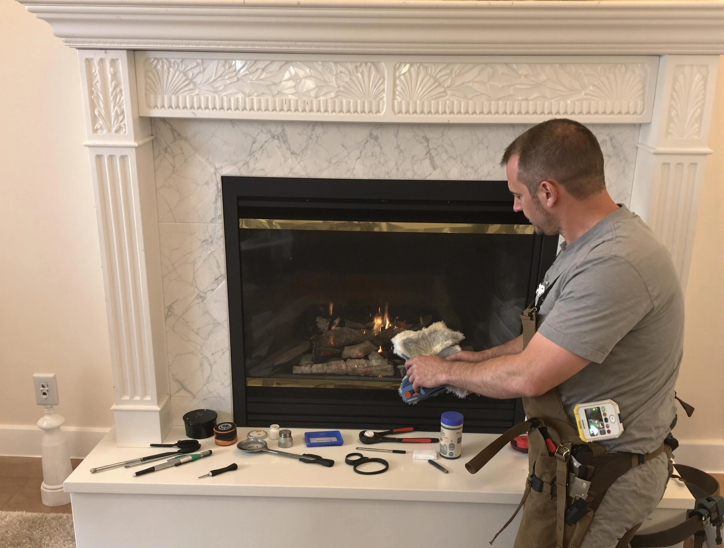 Bayonne Chimney Sweep performing fireplace maintenance in Bayonne, NJ
